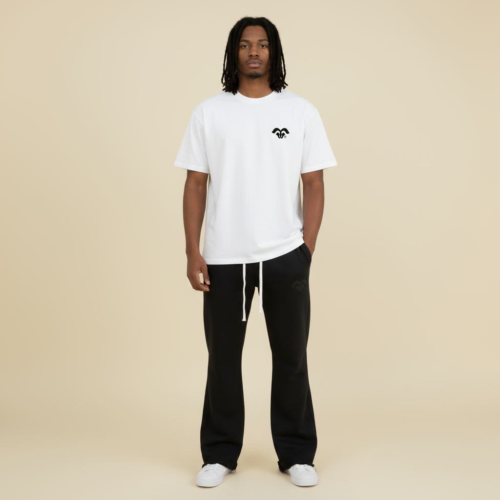 Model wearing BORNGOATD Logo Tee and GOATD Logo Joggers