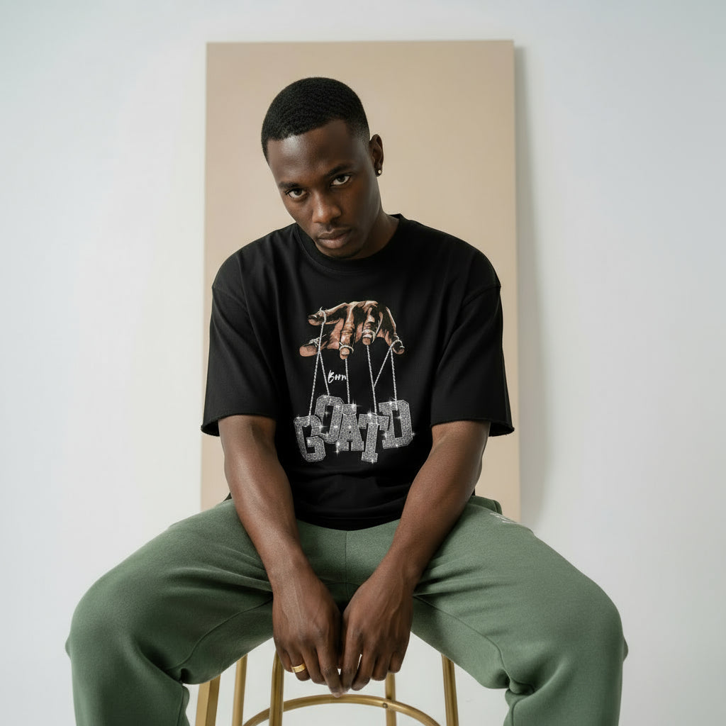 Worth One Billie collection by BORNGOATD – luxury streetwear statement tee with bold graphic design, symbolizing value, confidence, and self-worth.