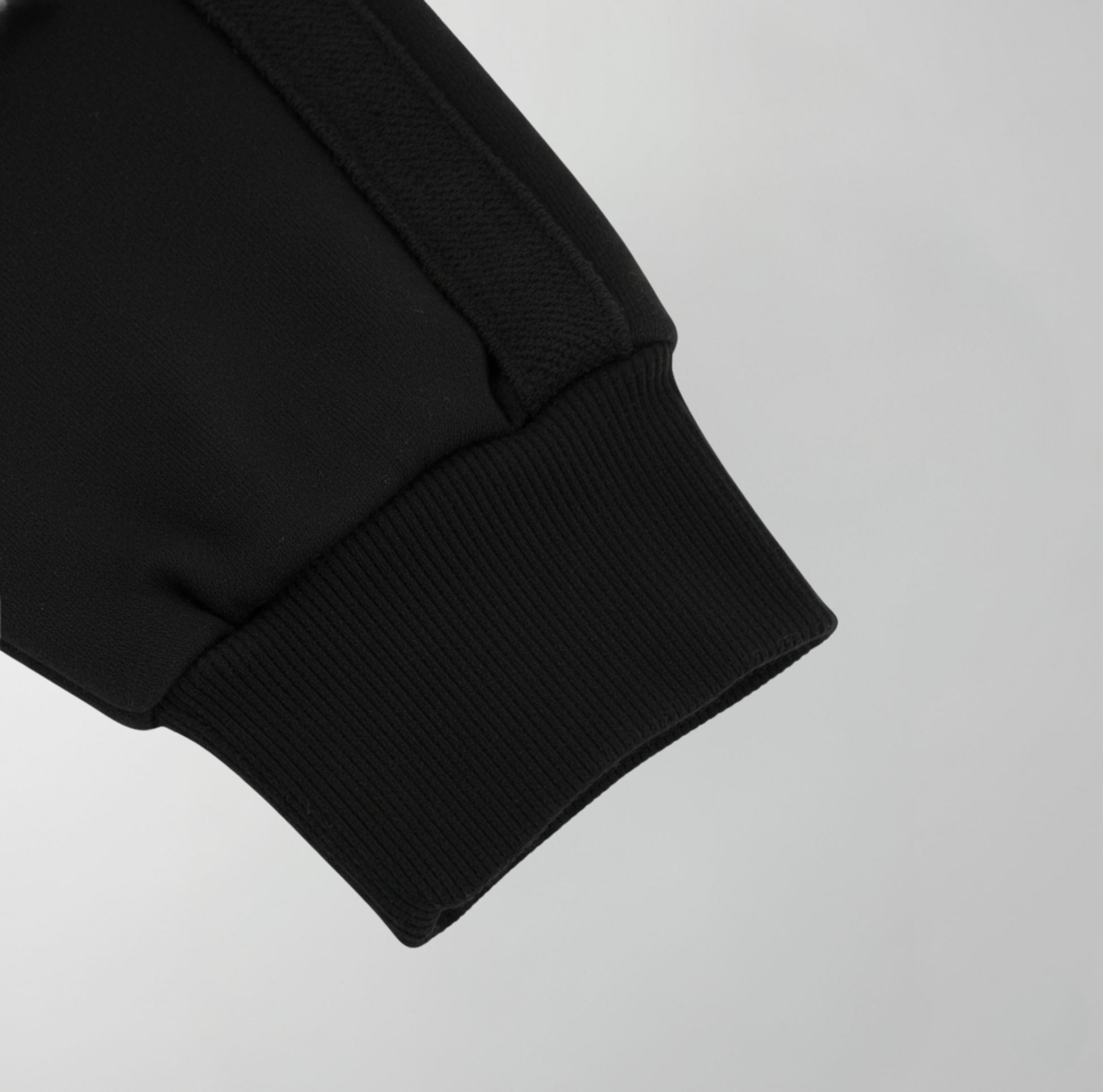 Close-up of a 1621 contrast hoodie sleeve