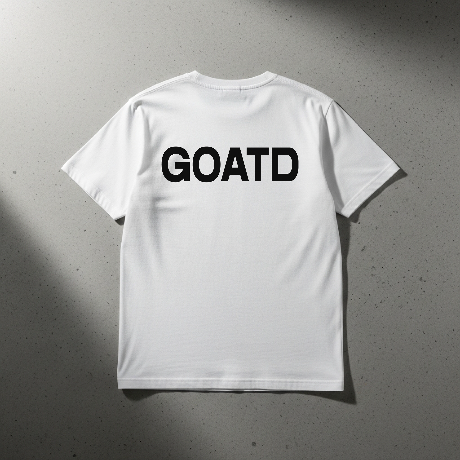 Close up shot of the BORNGOATD Logo tee with GOATD on the back