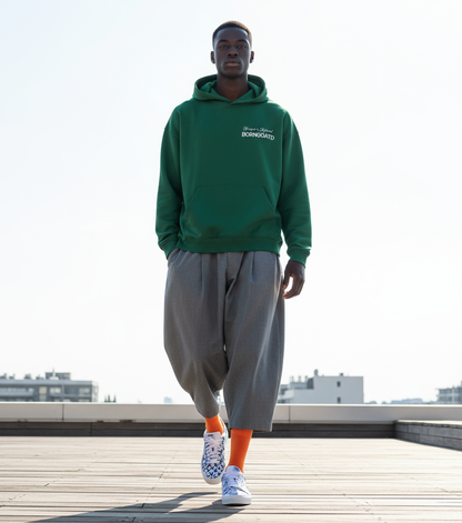Model wearing BORNGOATD Stamped x Approved Hoodie, relaxed fit.