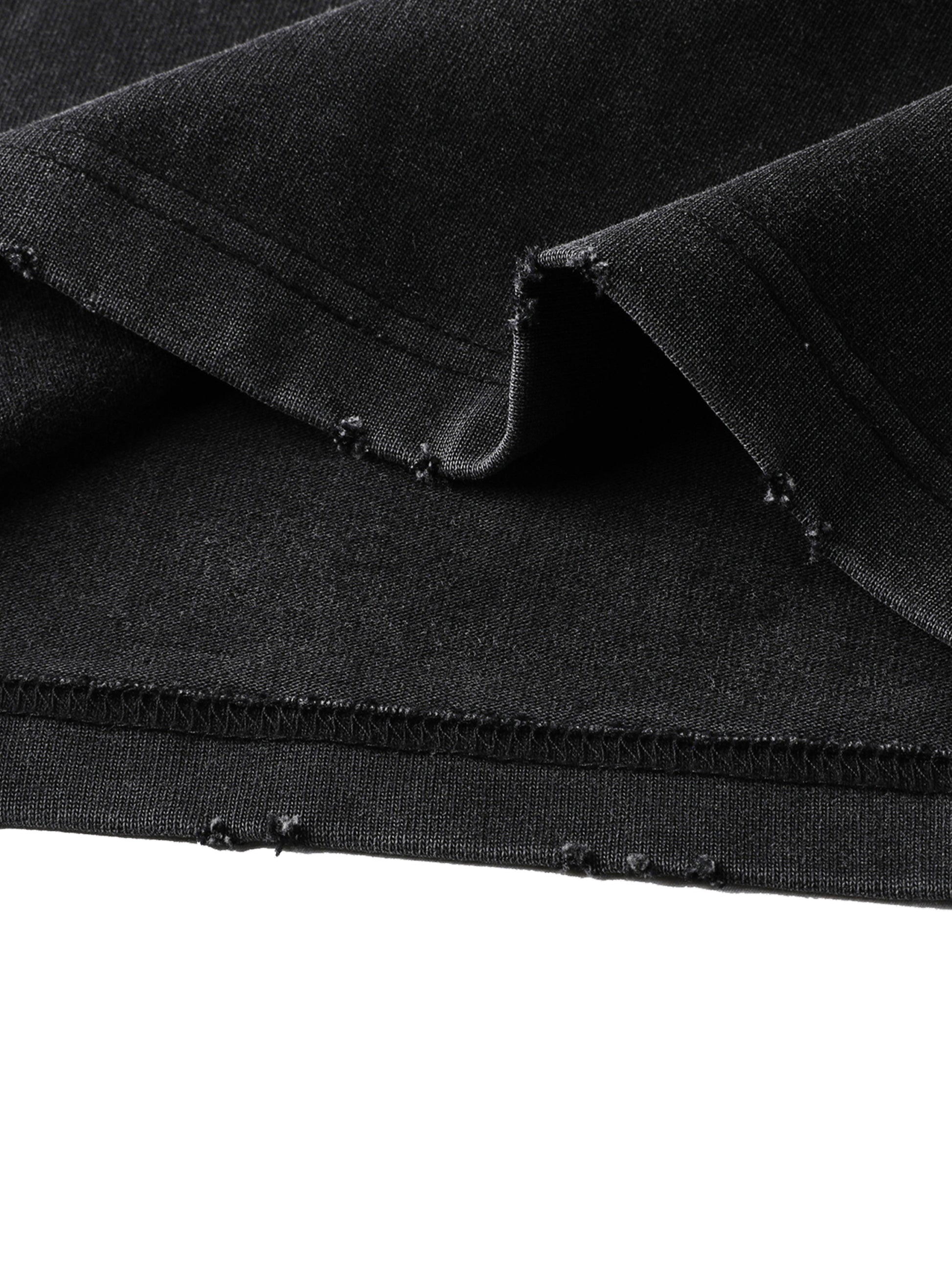 Close-up of frayed edges and heavyweight cotton texture on Property of BORNGOATD Tee