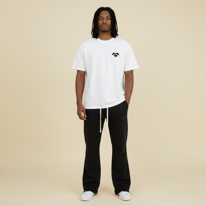 Model wearing BORNGOATD Logo Tee and GOATD Logo Joggers